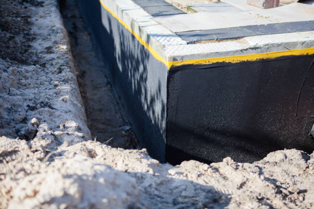 Professional Waterproofing technician working in Buckland, OH